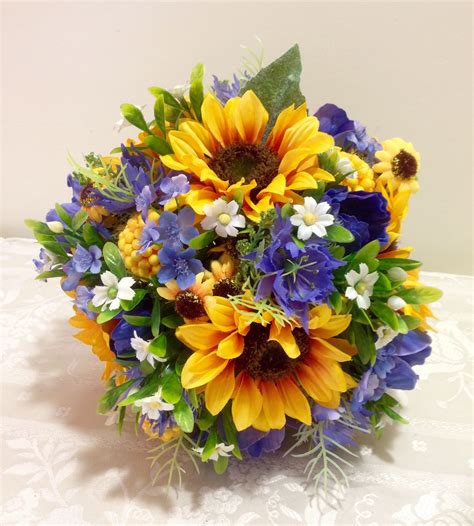 Summery Posy In Yellows And Blues Using Sunflowers Cornflowers And A