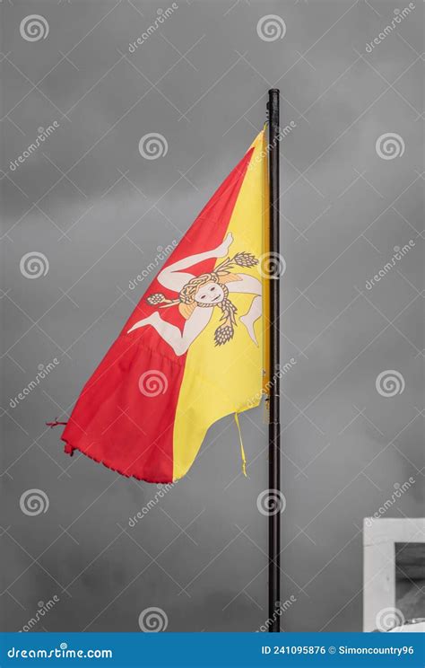 Sicilian Flag Waving in the Sky of Donnalucata, Scicli, Ragusa, Sicily, Italy Stock Photo ...