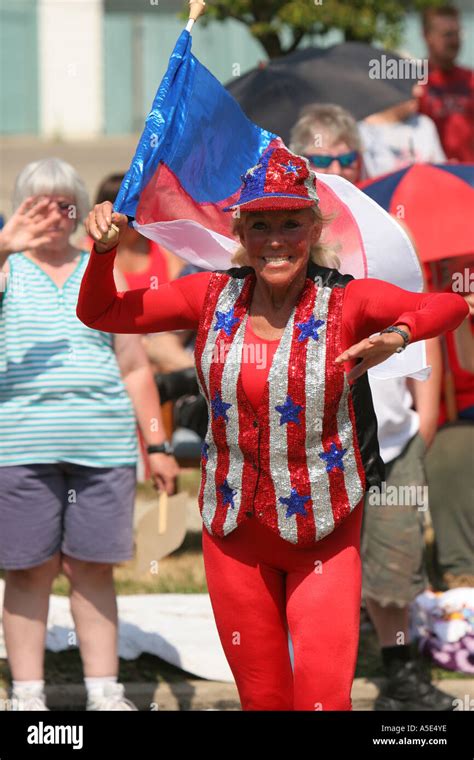 A person in patriotic attire in a Fourth of July parade Stock Photo - Alamy