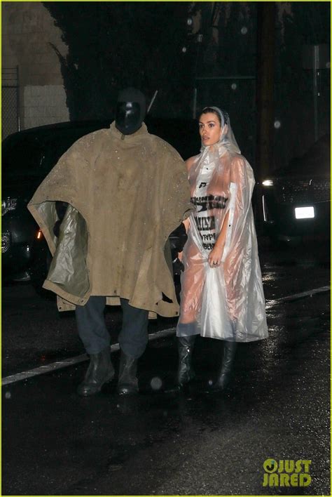 Kanye West S Wife Bianca Censori Braves The Rain In See Through Poncho