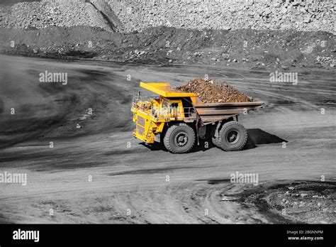 Big Yellow Mining Truck Transportation Of Gold Ore Open Pit Mine