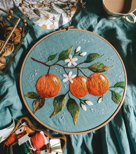 Embroidery Project Oranges And Flowers On Blue Cloth