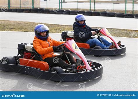 Girl is Driving Go-kart Car with Speed in a Playground Racing Track Stock Photo - Image of racer ...