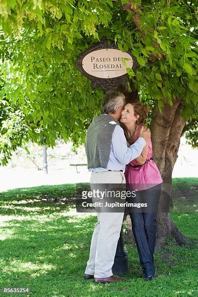 612 Couple Kissing Tree Stock Photos High Res Pictures And Images