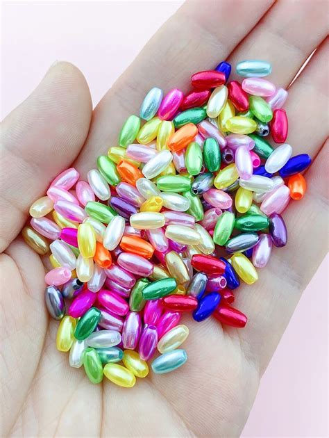 200 pièces Perles ovales en plastique de couleurs assorties convenant