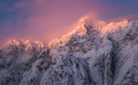 Premium Photo | Sunrise in the mountains covered with fresh snow