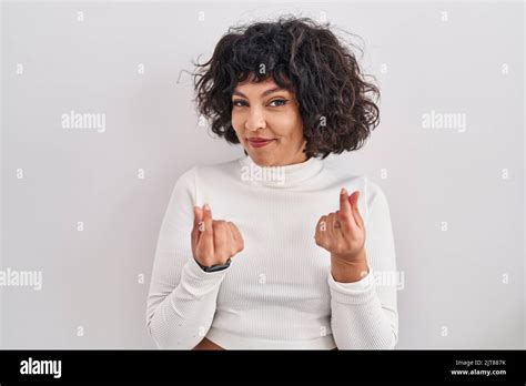 Hispanic Woman With Curly Hair Standing Over Isolated Background Doing