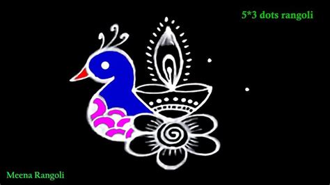 Diya rangoli design with peacock - peacock rangoli - vilakku kolam ...