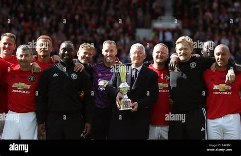 Manchester United Legends Manager Sir Alex Ferguson With The Trophy And