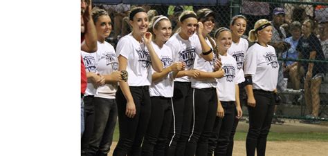 3 softball players play in Junior Olympic game