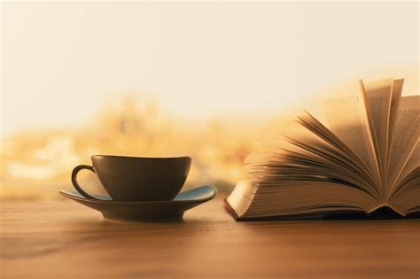 Premium Photo Coffee And Open Book