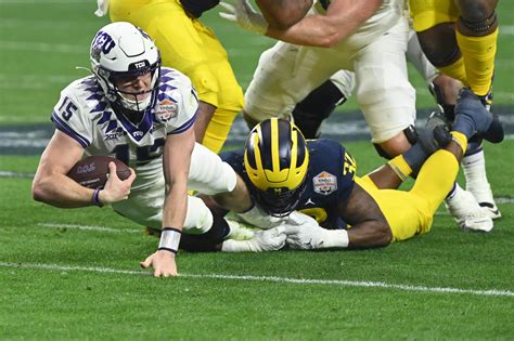 Tcu Stuns Michigan In High Scoring Fiesta Bowl To Advance To Cfp