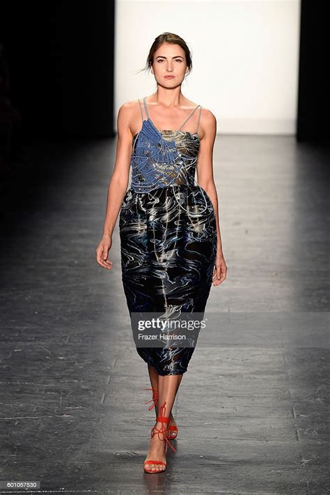 A model walks the runway at the Project Runway fashion show during ...