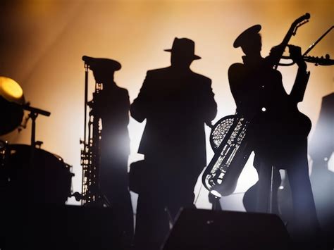 Premium AI Image Silhouette Of A Musicians Playing Jazz AI Generated