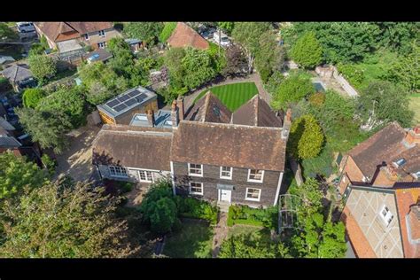 In Pictures Hapa Architects Unveils Black Tile House News Building