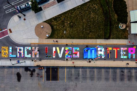 Black Lives Matter Mural Painted By 18 Artists Takes Over Uptown Street