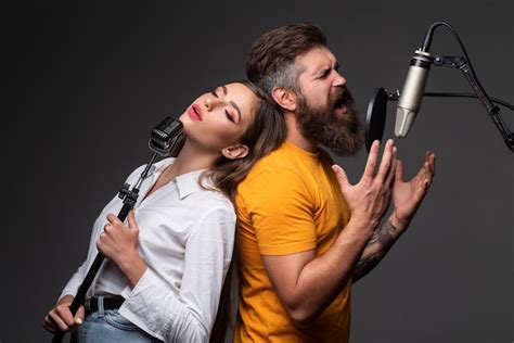 Premium Photo Singing Man In A Recording Studio Expressive Couple