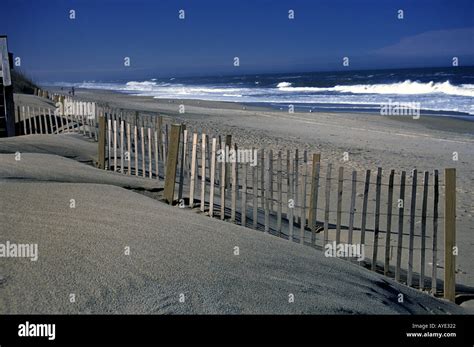 Fence On Sand Dune Too Stock Photo Alamy