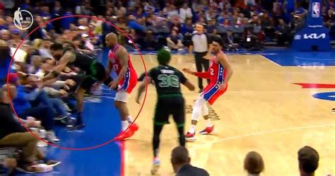 Celtics' Jayson Tatum suffers injury scare after diving into courtside fan