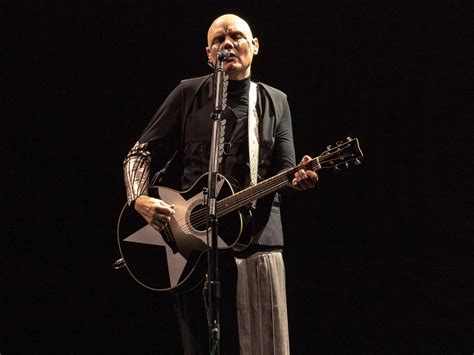 Billy Corgan on guitar solos even though “you weren't supposed to”