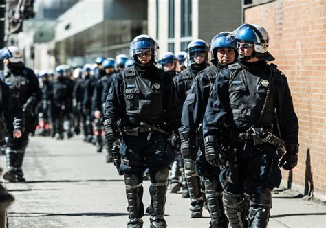 Premium Photo Cops Following Marchers In Case Of Something Goes Wrong