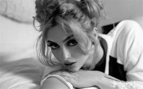 Gigi Dolin Gives A Seductive Gaze In Cheeky Black One-Piece Photo Drop