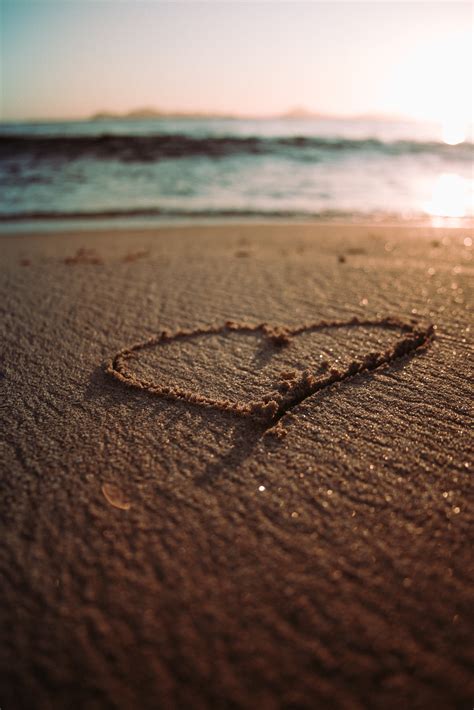 Heart Drawing on a Sandy Beach · Free Stock Photo