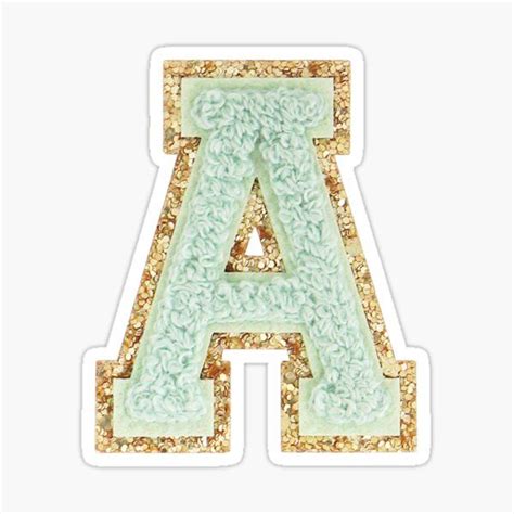 The Letter Sticker In Gold And Green Glitter