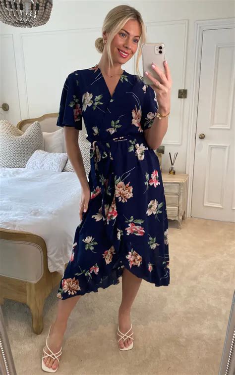 Mela Floral Dip Hem Wrap Midi Dress In Navy Mela London Silkfred Us