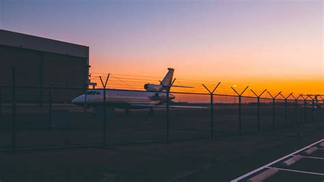 Download International Passengers Navigating Terminal At Airport