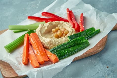 Premium Photo Hummus With Vegetable Sticks From Pepper Cucumber