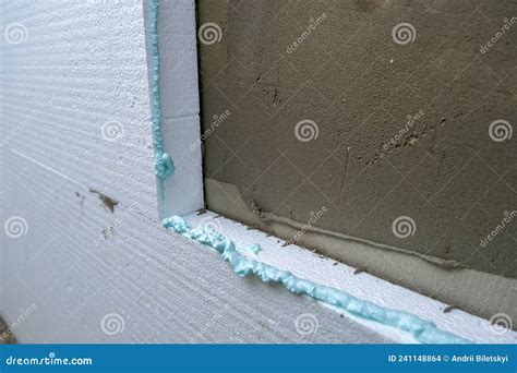 Installation of Styrofoam Insulation Sheets on House Facade Wall for ...