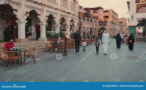 Souq Waqif In Doha Qatar Main Street Panning Shot At Sunset Stock