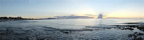 Panoramic Sunset on the beach 1358330 Stock Photo at Vecteezy