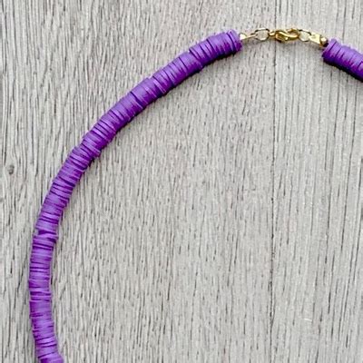 Collar Morado Con Dijes AHUVA