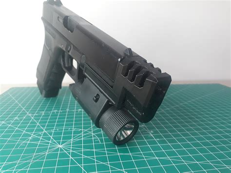 Archivo STL Compensador con raíl para pistola de airsoft GBB Glock 17