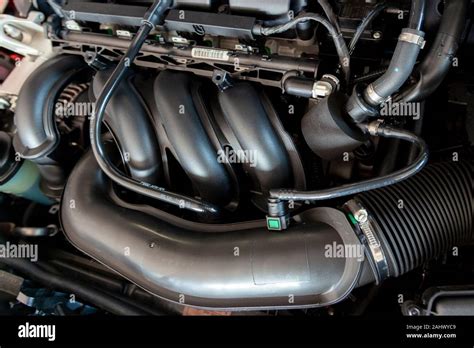 New car engine. Car hood open. Automotive industry Stock Photo - Alamy