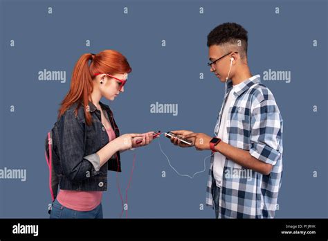 Smart Nice People Using Their Smartphones Stock Photo Alamy