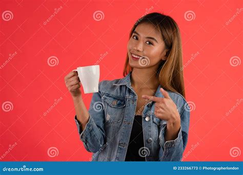 Two Asian Coffee Waitress Making Cup Of Hot Coffee Latte In Coffee Shop