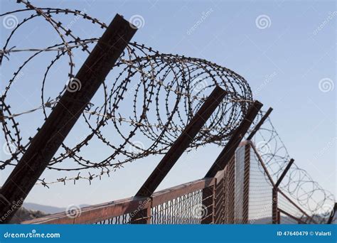 Security With A Barbed Wire Fence Protection Concept Design Stock