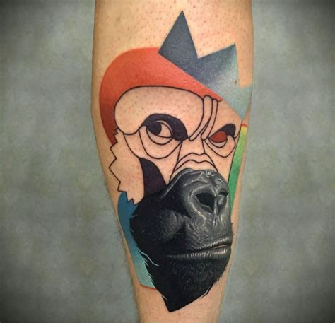 Half realistic half illustrative style colored forearm tattoo fo gorilla - Tattooimages.biz