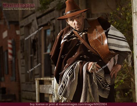 Portrait Of A Cowboy Notorious Villain In Wild West Style Stock Photo