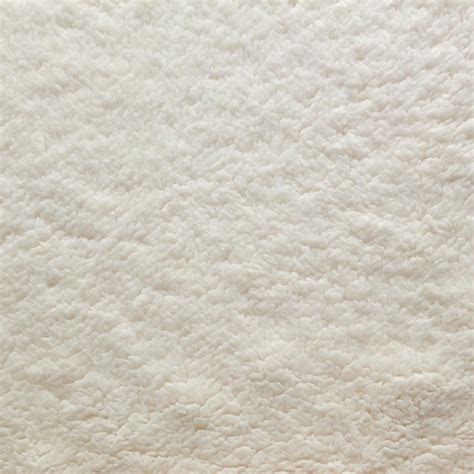 Cream coloured fleece fabric. Really soft fluffy knitted jersey fleece, perfect for lining ...