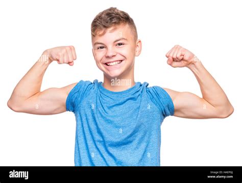 Boy flexing biceps hi-res stock photography and images - Alamy