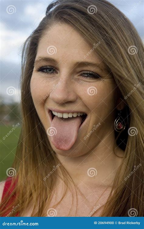 Sticking Out Her Tongue Stock Photo - Image: 20694900