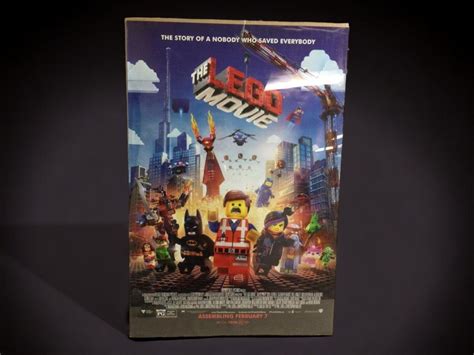 At Auction: Lego Movie Poster on Board w Plexi