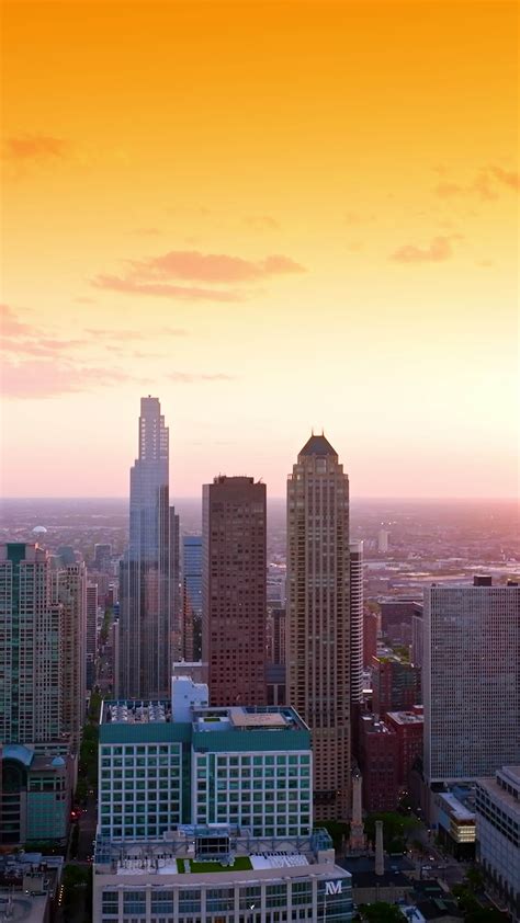 Fascinating scenery of the huge city at sundown. Terrific buildings and