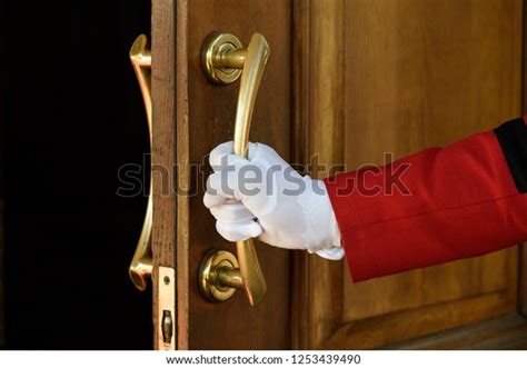 Doorman Opens Hotel Door Hands White Stock Photo Edit Now 1253439490