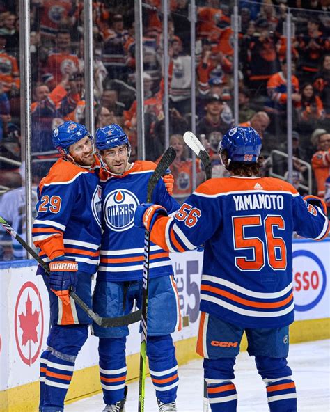 the edmonton oilers players are congratulating each other