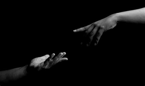 Premium Photo Close Up Of Hands Of Couple Gesturing Against Black